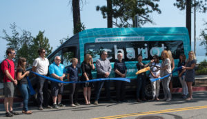 A ribbon cutting ceremony for the Chariot microtransit service