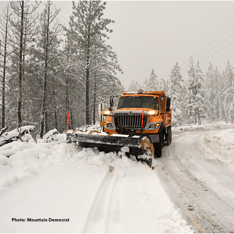 A truck plowing roads.