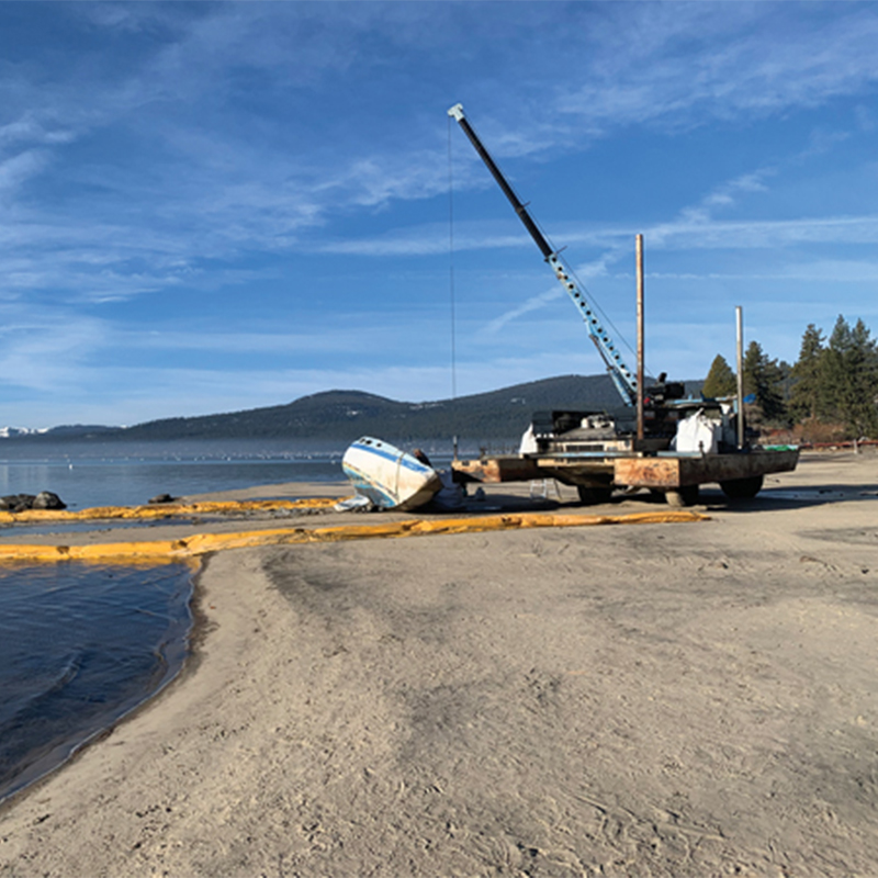A sunken boat being removed from Kings Beach, Lake Tahoe.