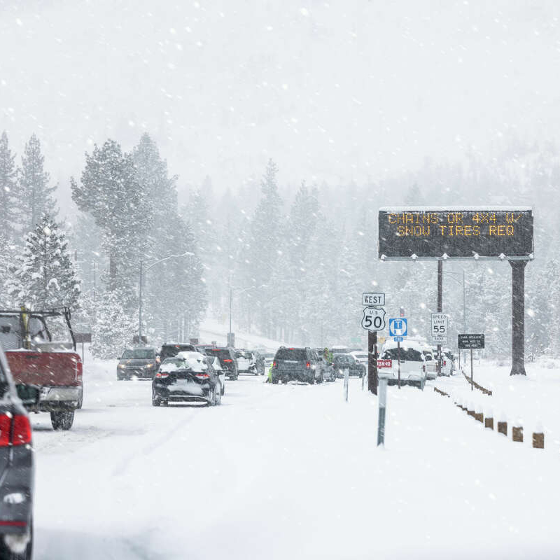 Cars driving in the snow.