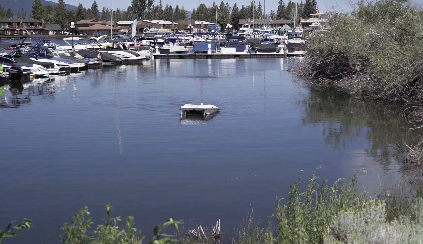 PixieDrone skimming near boat slips in the Tahoe Keys Marina.