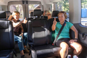 happy riders on the Emerald Bay Shuttle.